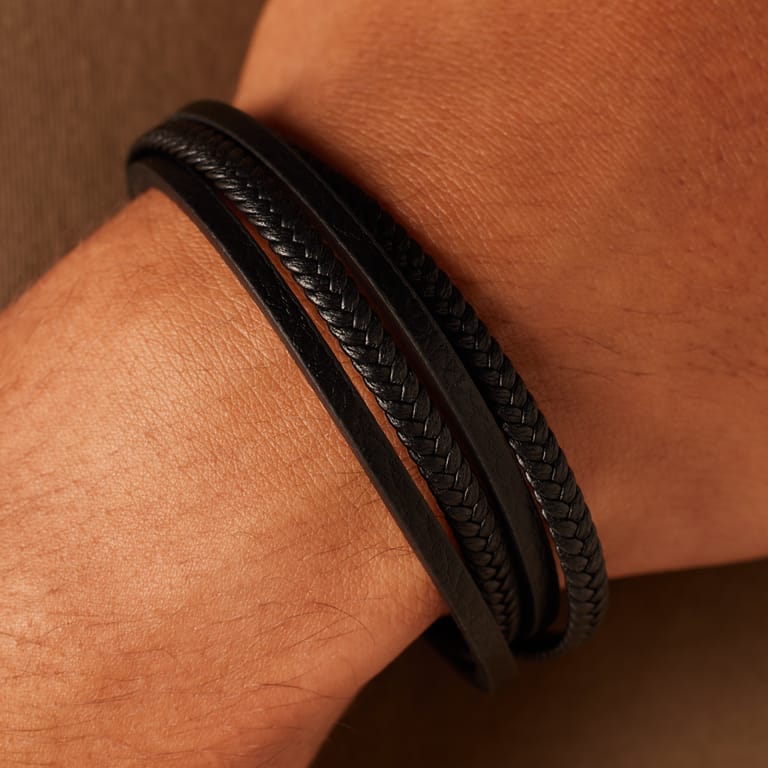 Stalen blackplated herenarmband gevlochten leer