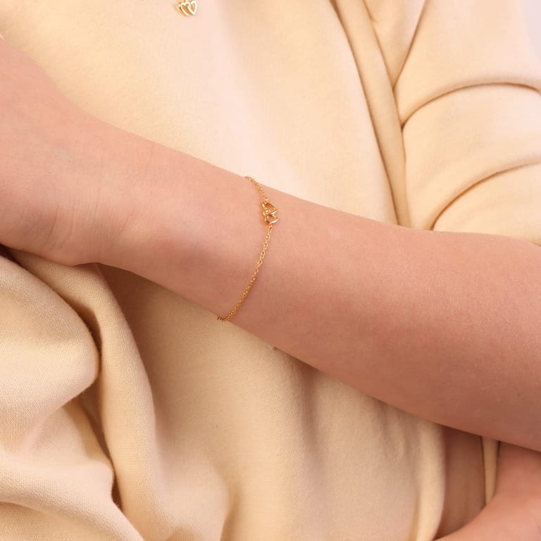 Zilveren goldplated kinderarmband hart