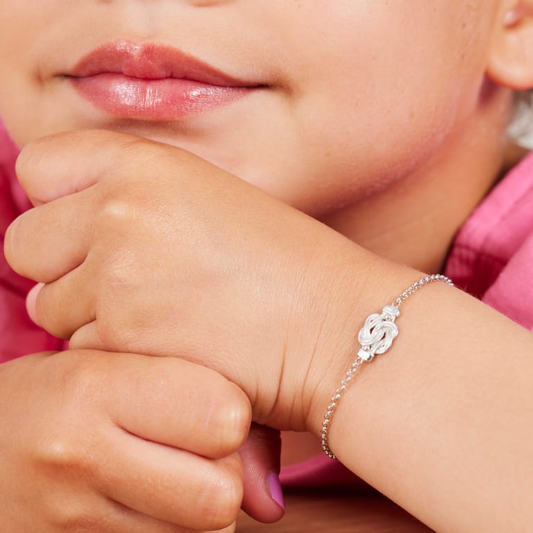Gerecycled zilveren kinderarmband Surinaamse mattenklopper.  