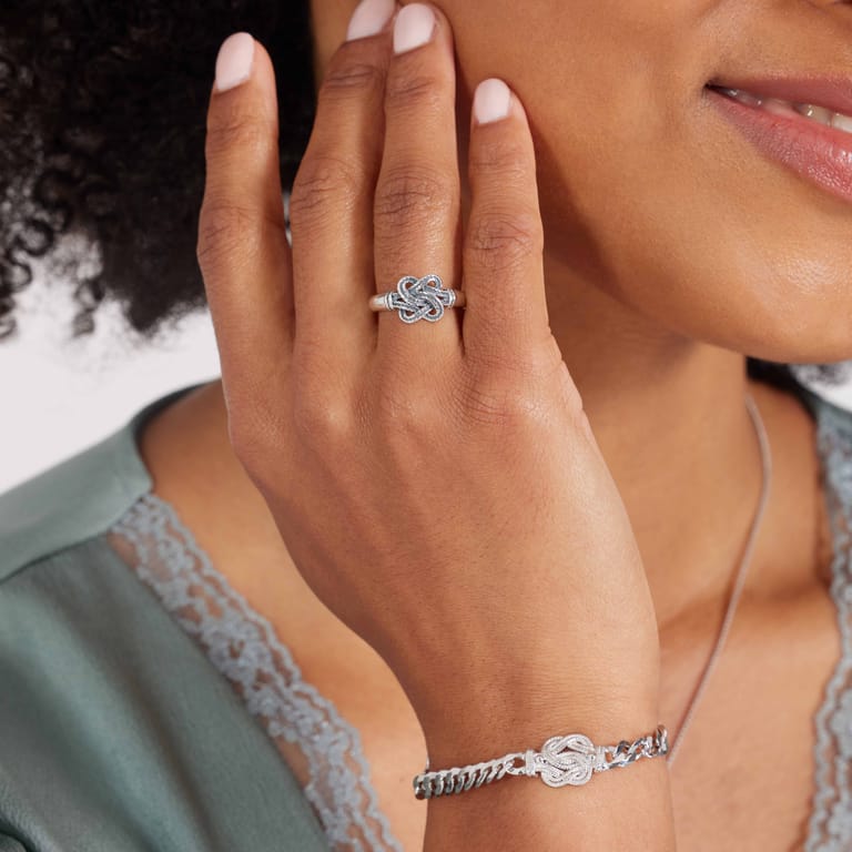 Zilveren ring Surinaamse mattenklopper