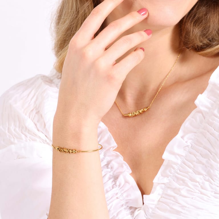 Stainless steel goldplated letterhanger voor dames