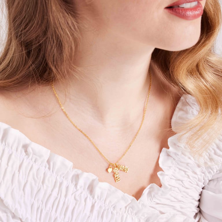 Zilveren naamketting verticaal datum+hart