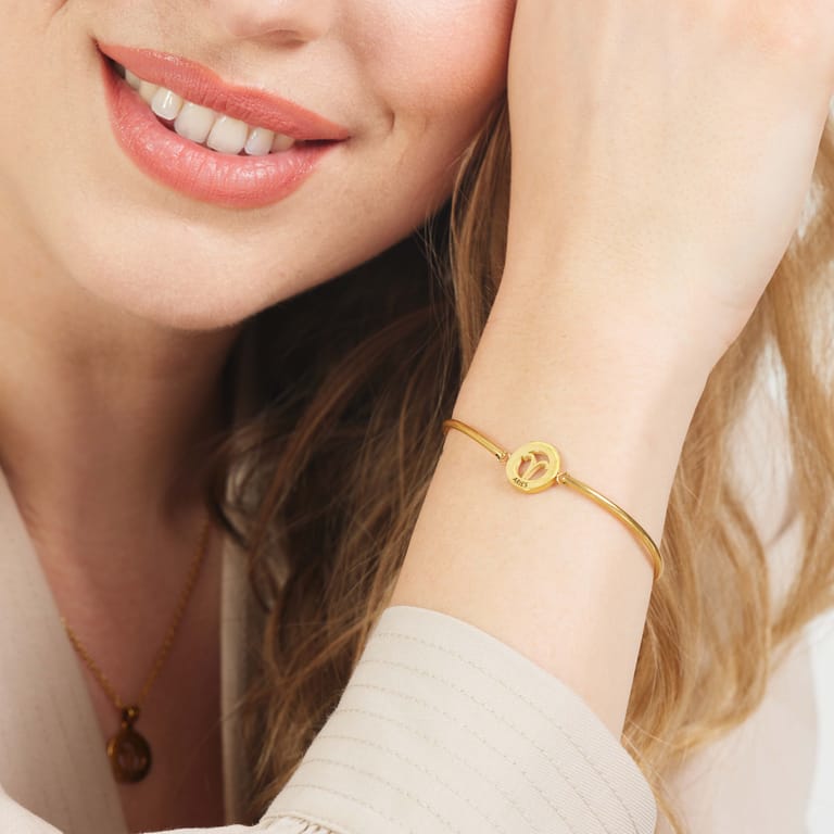 Stalen goldplated armband met sterrenbeeld ram