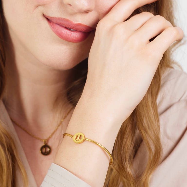 Stalen goldplated fantasiearmband met letterhanger L voor dames