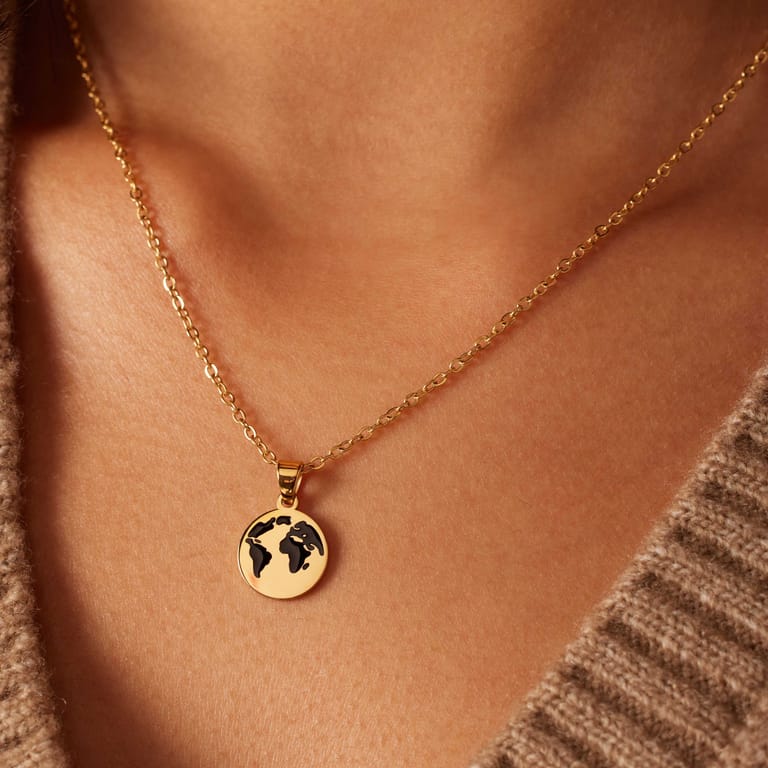 Stainless steel goldplated ketting met hanger wereldbol