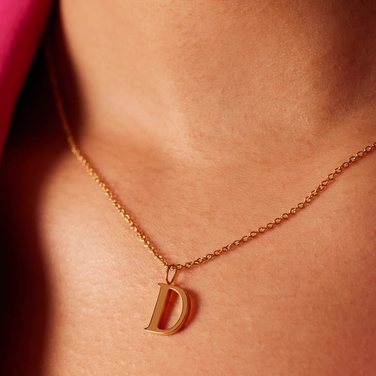 Stalen goldplated ketting met letterhanger D voor dames