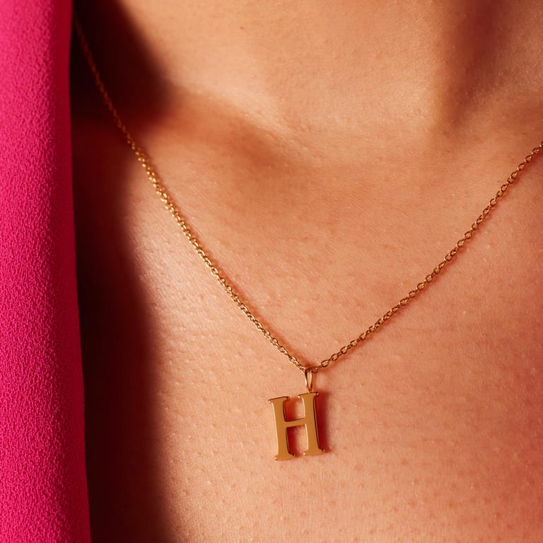 Stainless steel goldplated ketting letter H