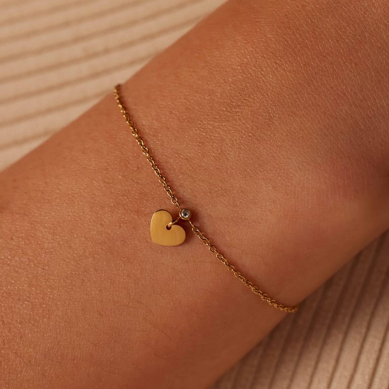 Stalen goldplated bedelarmband met hanger hart met zirkonia voor dames
