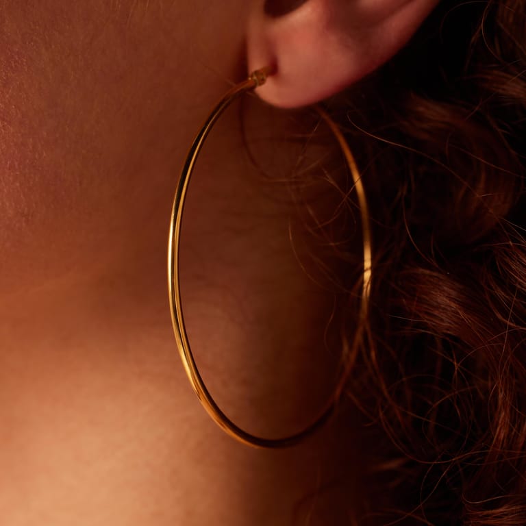 Stainless steel goldplated oorringen 65mm voor dames