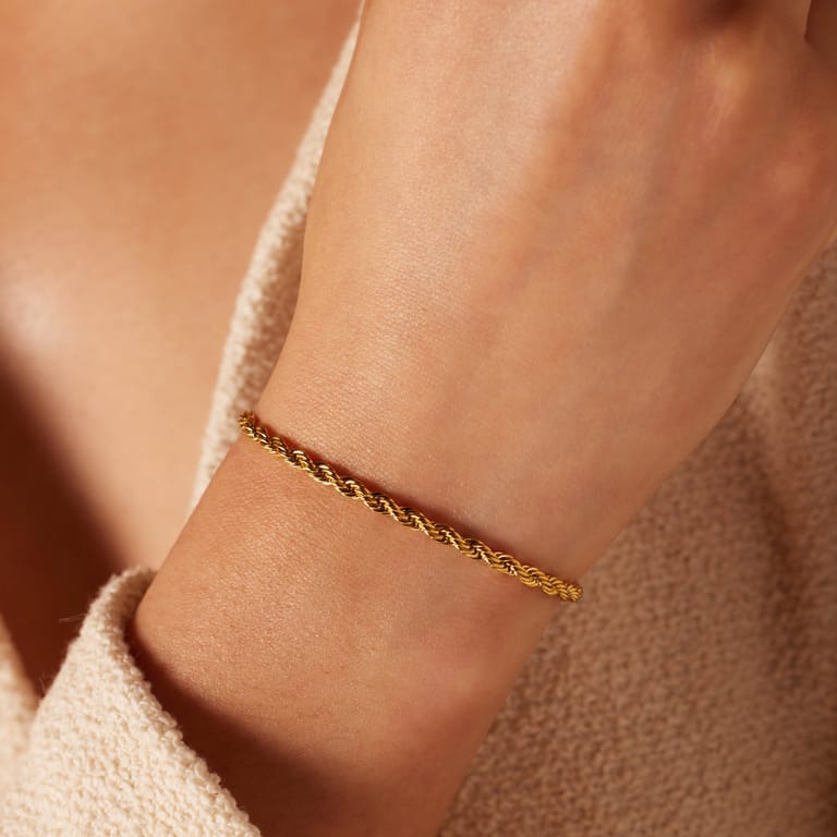 Stalen goldplated schakelarmband 3mm