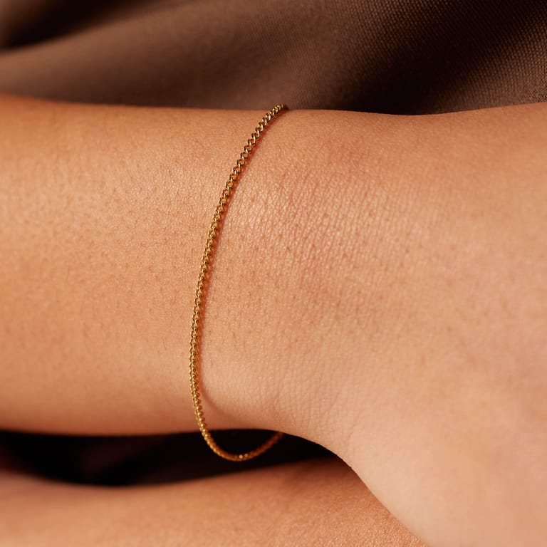 Stalen goldplated schakelarmband 1mm