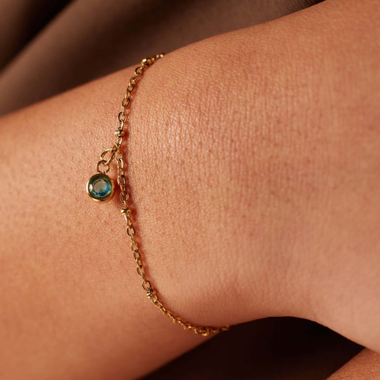 Stainless steel goldplated fantasiearmband met geboortesteen Maart voor dames