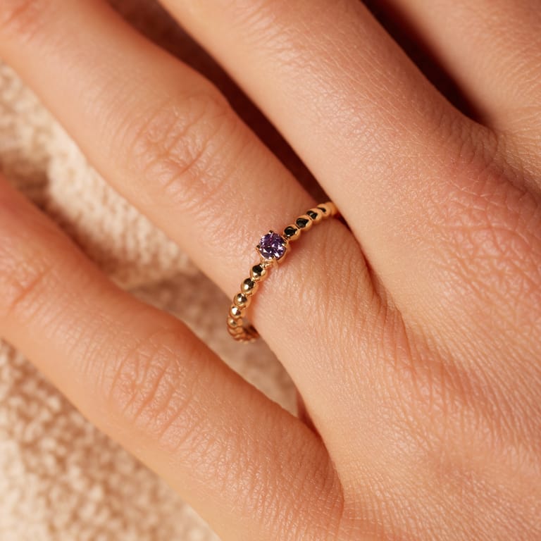 9 karaat ring met paarse zirkonia