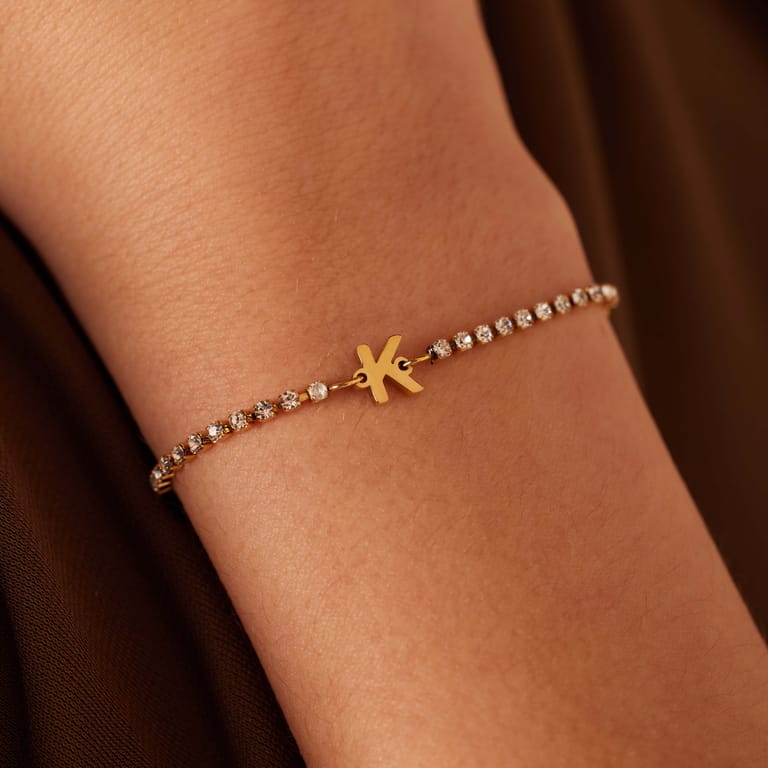 Stalen goldplated fantasiearmband met letterhanger K met zirkonia voor dames