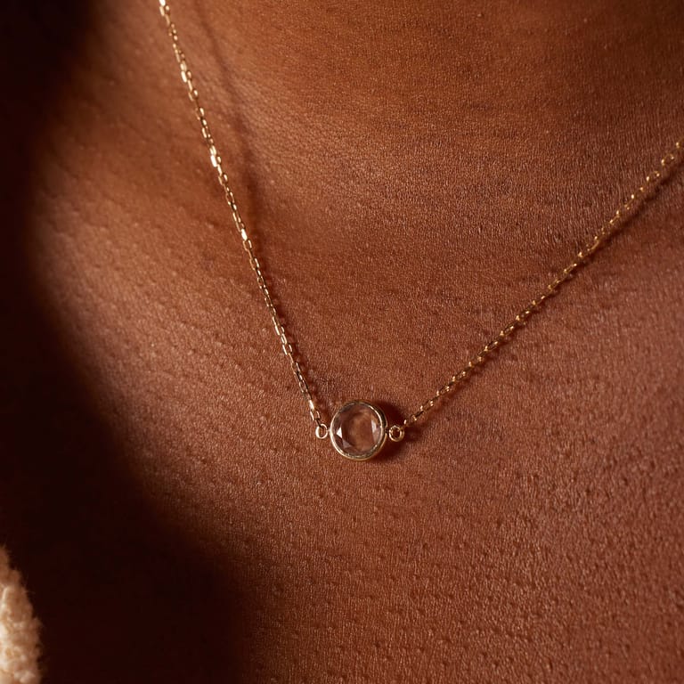 14 karaat geelgouden ketting met geboortesteen hanger April