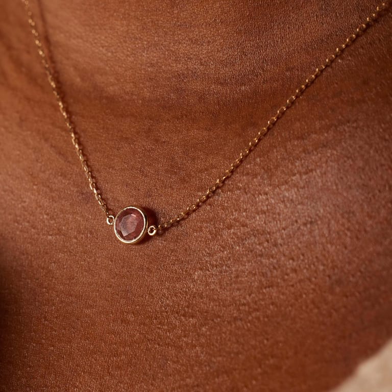 14 karaat geelgouden ketting met geboortesteen hanger Oktober