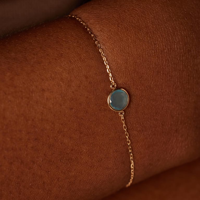 14 karaat geelgouden armband met geboortesteen hanger December