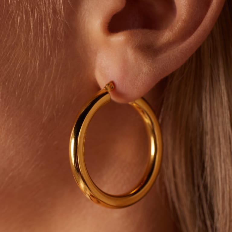 Camille stainless steel goldplated oorringen glad voor dames