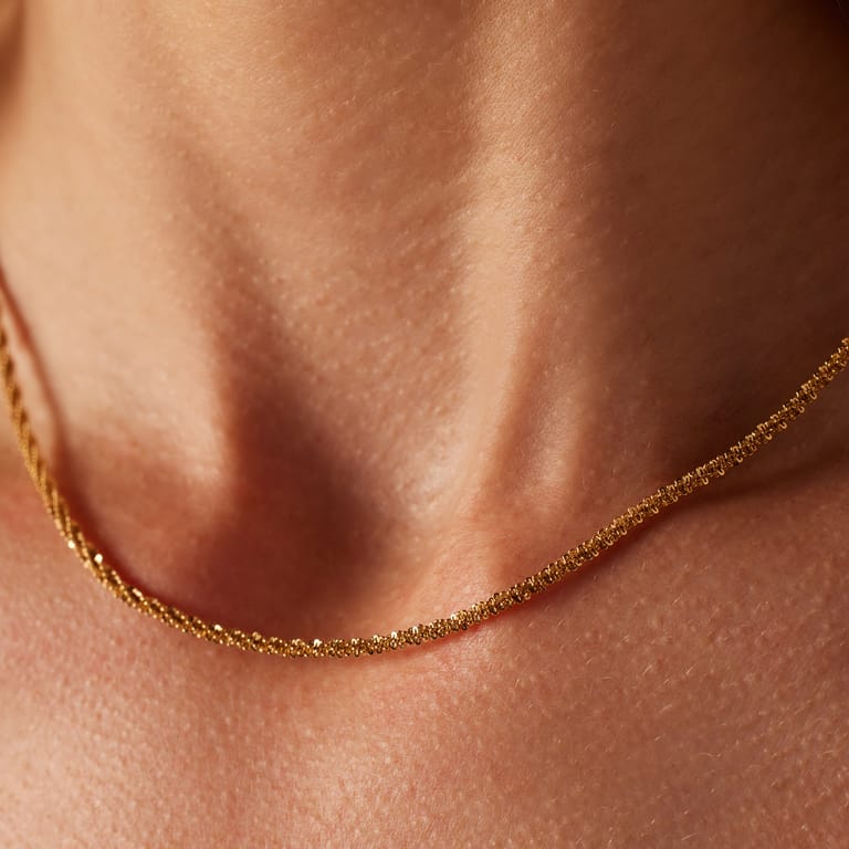 Myla stainless steel goldplated ketting met schakel gedraaid voor dames