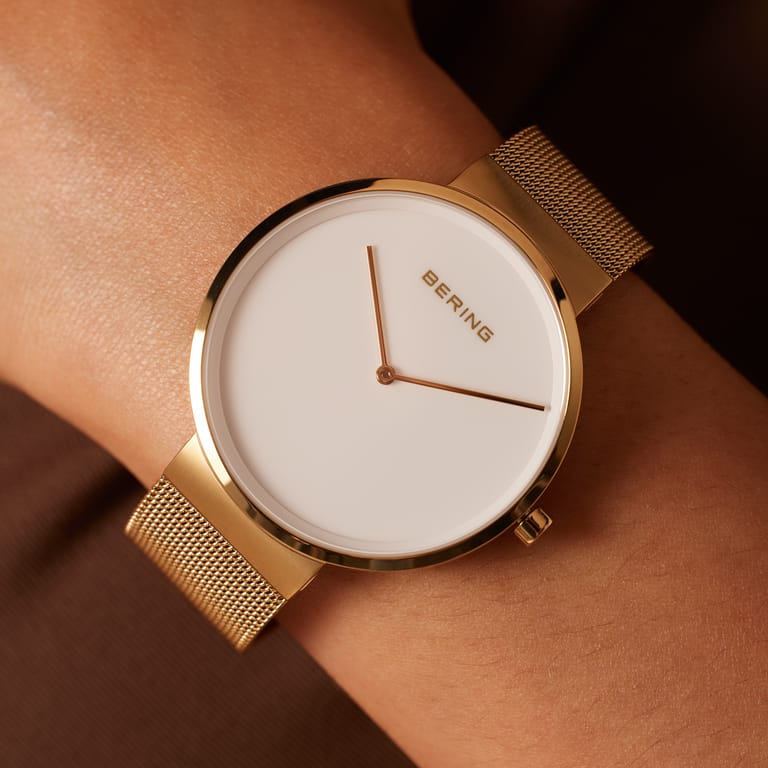 Bering horloge met mesh band goudkleurig 14539-334