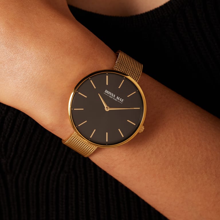 Donna Mae horloge mesh band goudkleurig