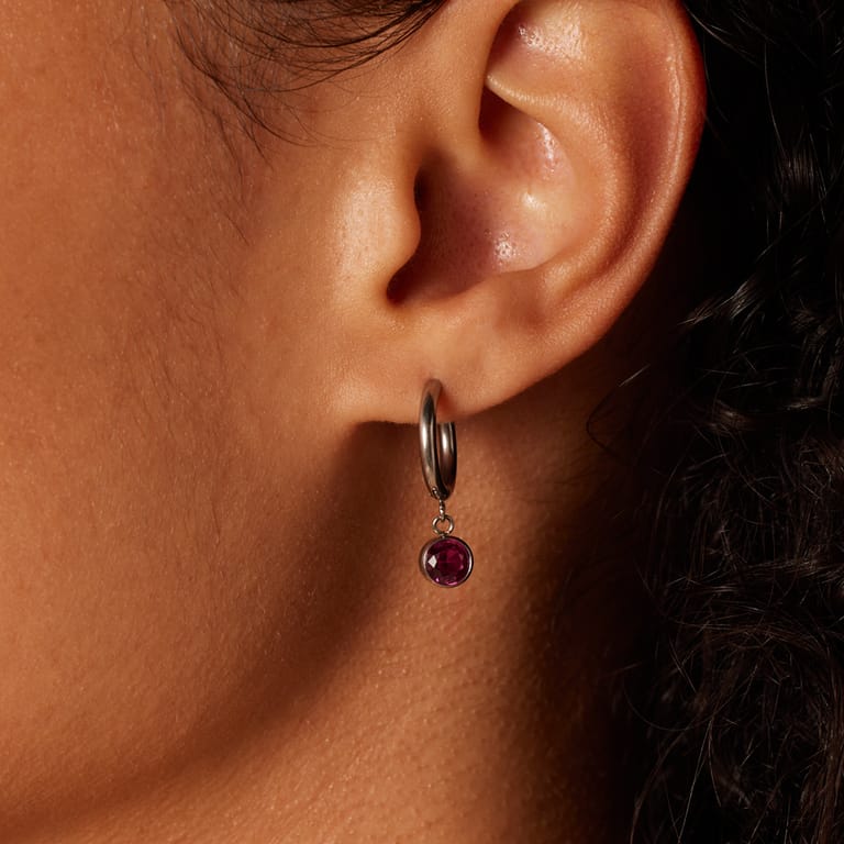 Stainless steel oorbellen met geboortesteen juli