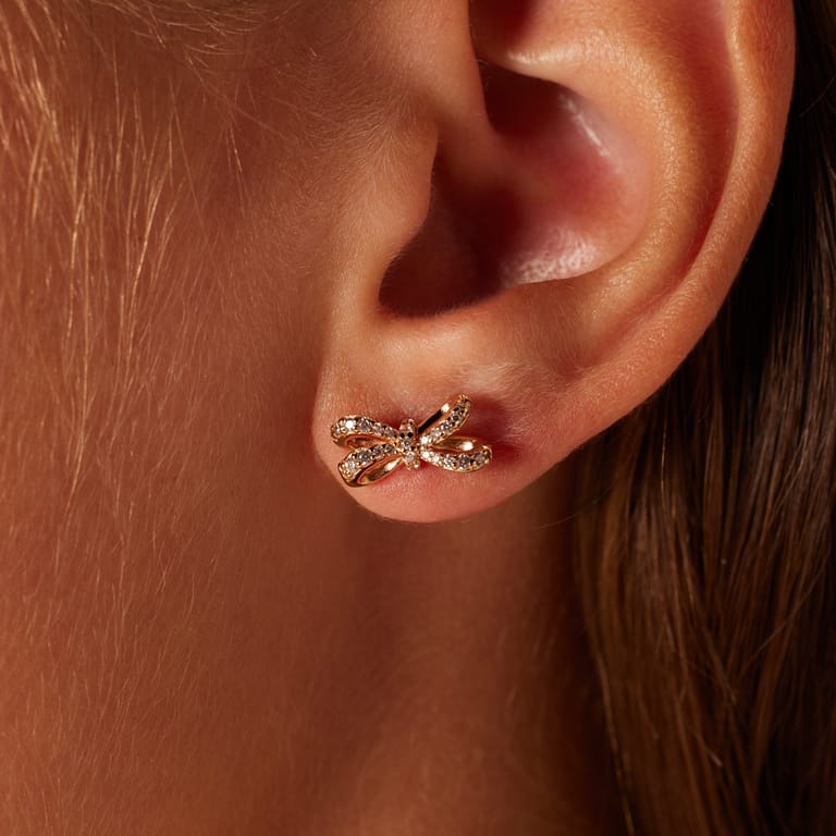 Zilveren goldplated oorknoppen strik met zirkonia voor dames