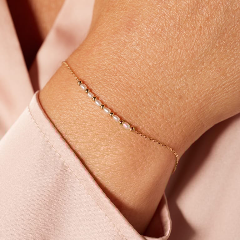 14 karaat geelgouden armband met zoetwater parels