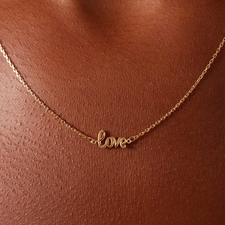 9 karaat ketting met de tekst love