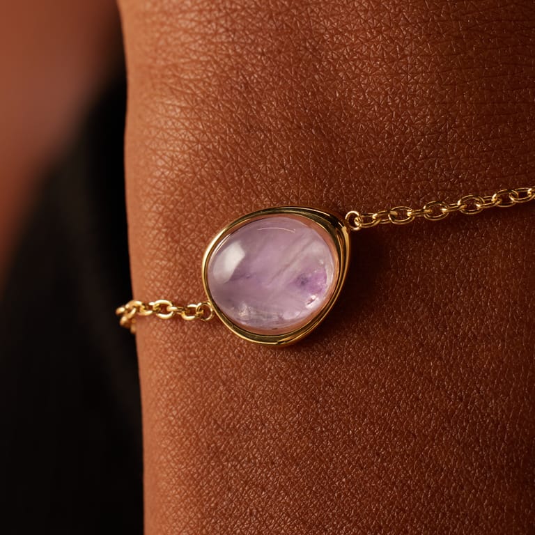Stainless steel goldplated armband met amethyst ovaal