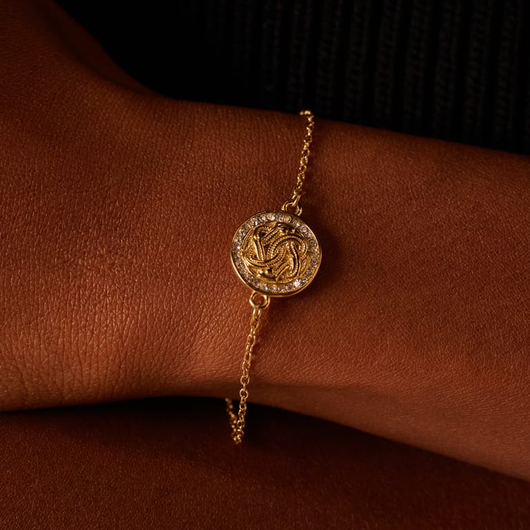 Stainless steel goldplated armband met mattenklopper