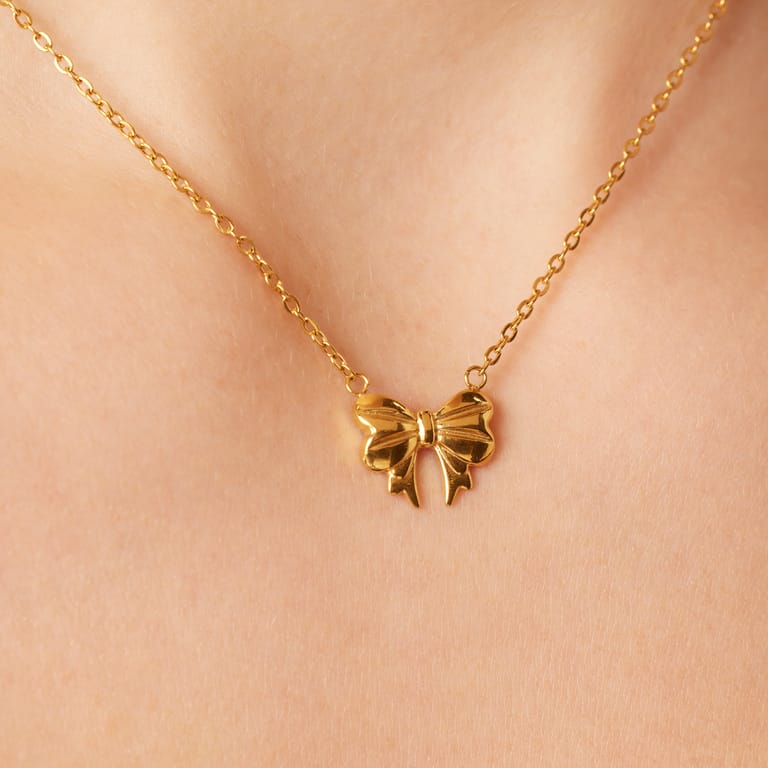 Stainless steel goldplated ketting met strik