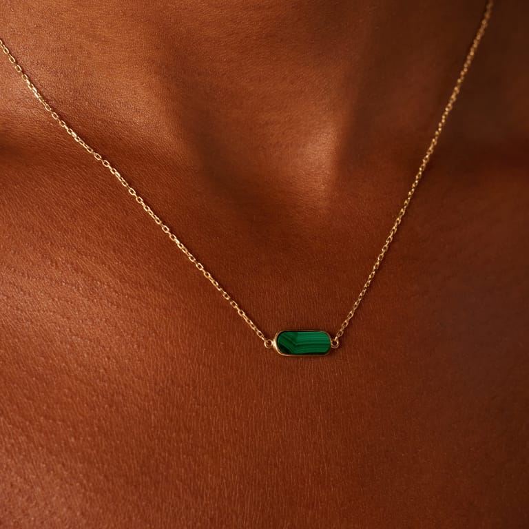 14 karaat geelgouden ketting met malachite
