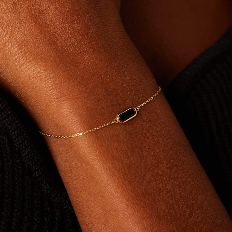 14 karaat geelgouden armband onyx