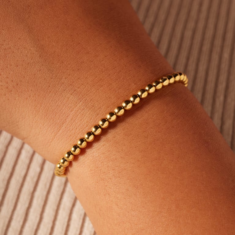 Stainless steel goldplated kralenarmband voor dames