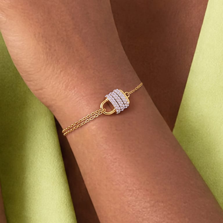 Guess Edelstahl goldplattiertes Fantasiearmband mit Kristall für Damen