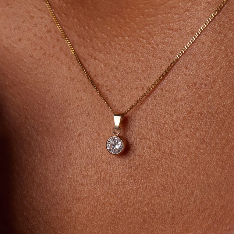 14 Karat Goldanhänger mit 5 mm Zirkonia