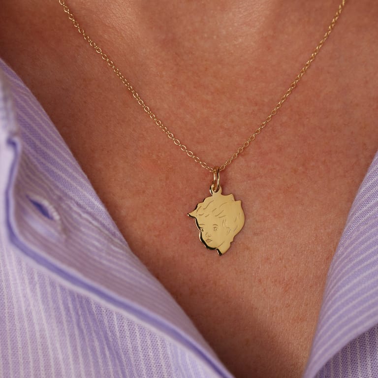 Zilveren goldplated hanger kinderkopje jongen