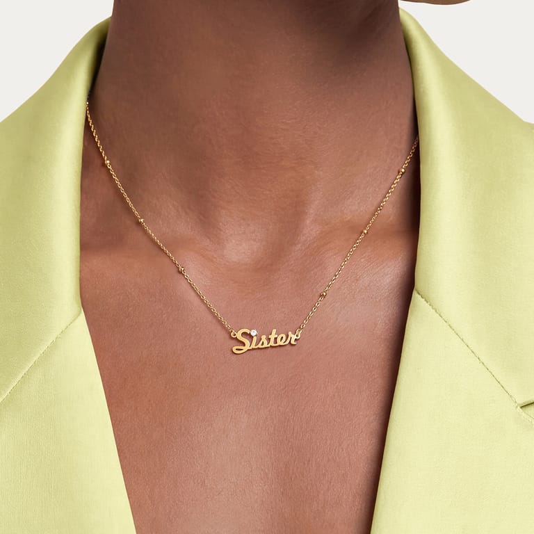 Edelstahl goldbeschichtete Namenskette Sister mit Zirkonia für Damen