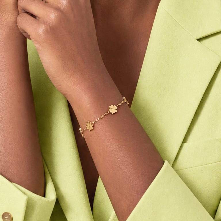 Stainless steel goldplated armband met hanger klavertje vier voor dames