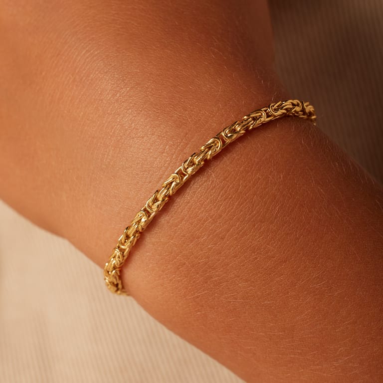 Zilveren goldplated kinderschakelarmband