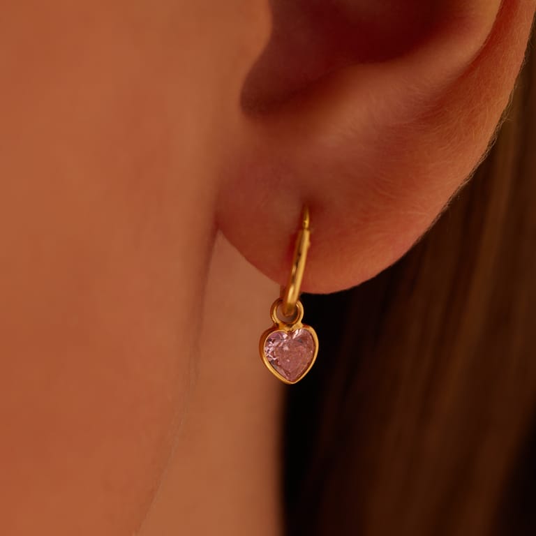 Zilveren goldplated oorringen met roze hartje
